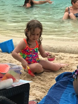 Zoe - playing in the sand
