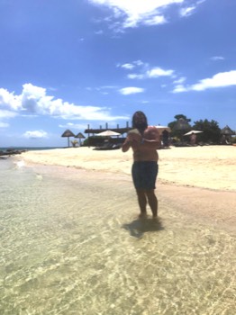 Nat - taking photos of the baby sharks on Savala Island